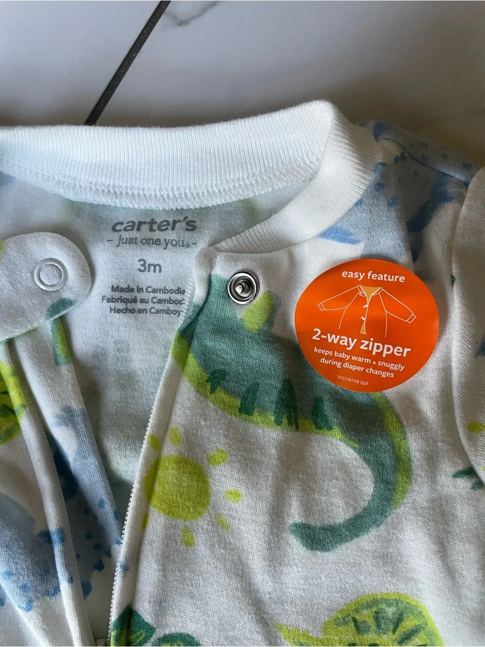 Carter's White Footed One-Piece Pajamas with Green and Blue Dinosaurs